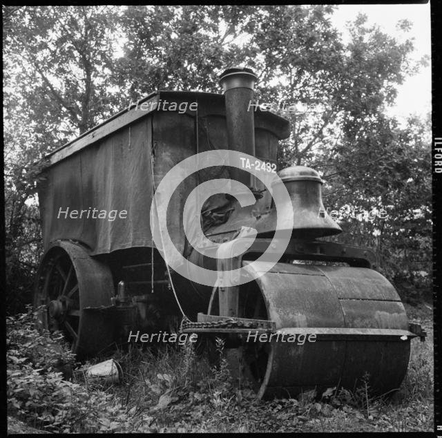 Steamroller abandoned in the corner of a field, Devon or Cornwall, 1967. Creator: Eileen Deste.