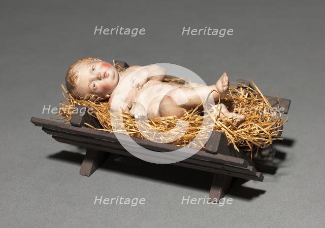 Figure from a Crèche: Infant Christ with Crib and Straw, 1780-1830. Creator: Unknown.