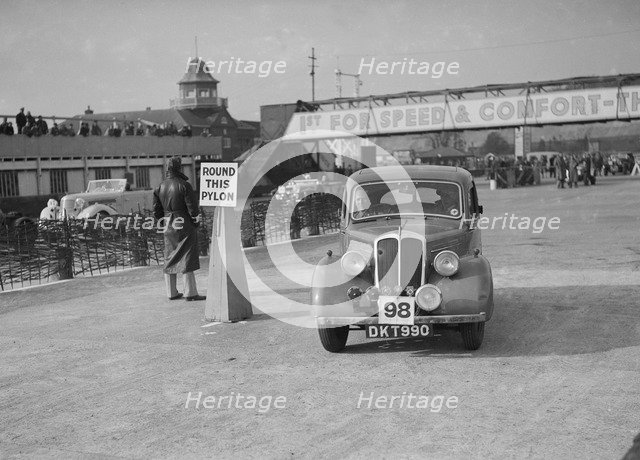 Standard competing in the JCC Rally, Brooklands, Surrey, 1939. Artist: Bill Brunell.