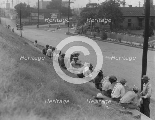 Waiting for the trucks to bring them to the cotton fields, Memphis, Tennessee, 1937. Creator: Dorothea Lange.