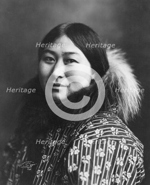 Eskimo woman, c1907, printed (1916?). Creator: Lomen Brothers.