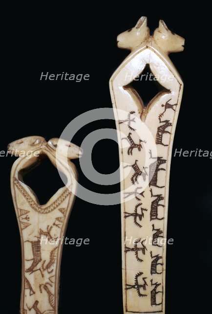 Inuit arrowshaft straightener. Artist: Unknown