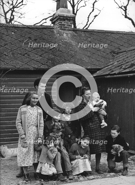 Travelling gipsy family re-housed in a bungalow, Beare Green, Surrey, 1964.