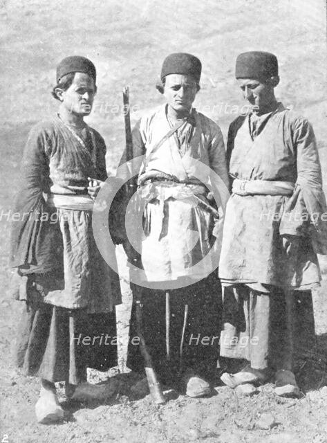 Threateners of Teheran: men who may capture the Shah - three young Bakhtiaris, 1909. Creator: Unknown.