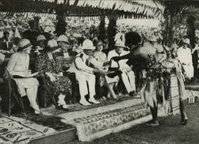 'At Suva, Fiji. Presenting a "Tabua" (Tooth of the Sperm Whale) ...1927', 1937. Creator: Unknown.