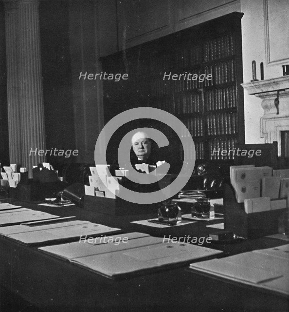 Winston Churchill in the Cabinet Room of 10 Downing Street', c1940s, (1945). Artist: Unknown.