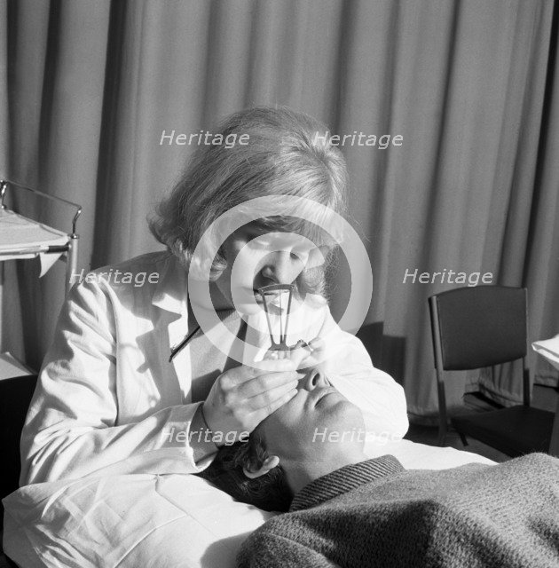 Medical eye checks, Rotherham General Infirmary, 1967. Artist: Michael Walters