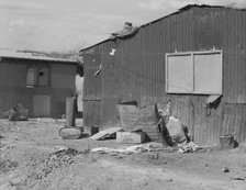 Housing for migratory cotton field laborers near Casa Grande, Arizona, 1937. Creator: Dorothea Lange.