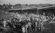 Louisiana Flood 1912, Cotton Compress at Vicksburg as a refuge, 1912. Creator: Bain News Service.