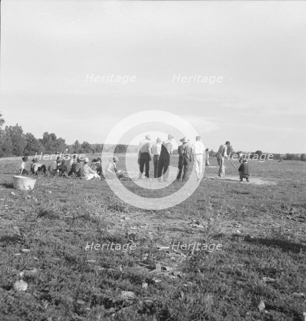 Farmers' baseball game in the country, on U.S. 62, near Mountain Home, northern Arkansas, 1938. Creator: Dorothea Lange.