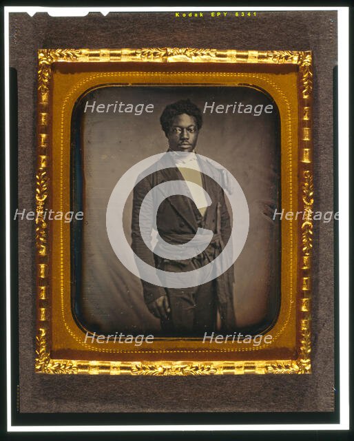Chancy Brown, three-quarter length portrait, facing front, between 1856 and 1858. Creator: Augustus Washington.
