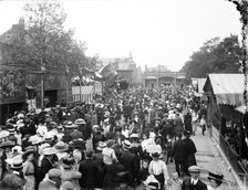 Crowded street lined with stalls during St Giles Fair, Oxford, Oxfordshire, c1860-c1922. Artist: Henry Taunt