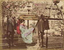 [Japanese Woman in a Chair Carried by Two Men], 1870s. Creator: Unknown.