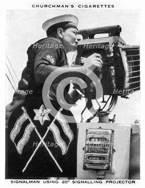 Signalman using 20 Signalling Projector, 1937.Artist: WA & AC Churchman