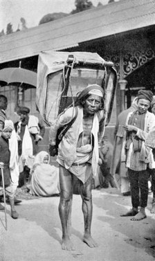 A labourer carrying tea, Darjeeling, West Bengal, India, c1910. Artist: Unknown
