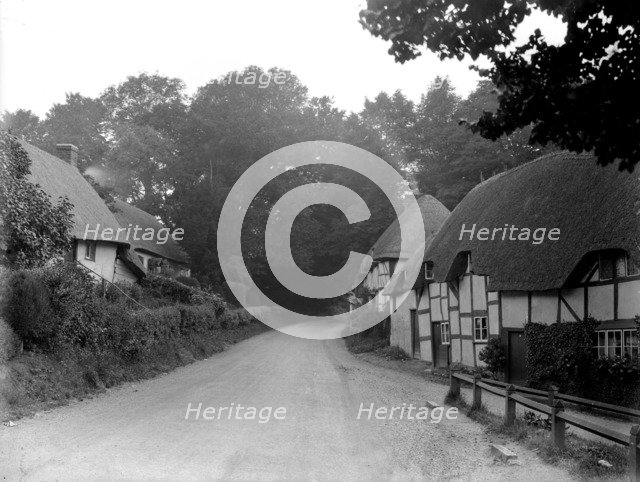 Timber-framed and thatched cottages at Wherwell, Hampshire, 1927. Artist: Nathaniel Lloyd