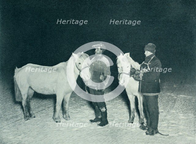 'Petty Officers Crean and Evans Exercising Their Ponies in the Winter', 1911, (1913). Artist: Herbert Ponting.