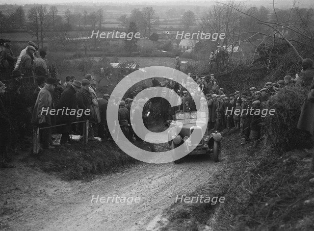 Alvis of RC Porter competing in the MCC Exeter Trial, Ibberton Hill, Dorset, 1930. Artist: Bill Brunell.
