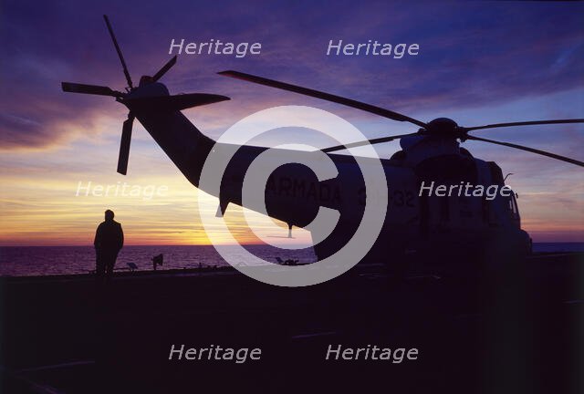 Helicopter on an aircraft carrier, Falklands War, 1982. Creator: Luis Rosendo.