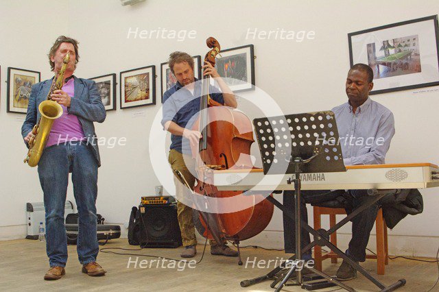 Basil Hodge, Ed Jones and Riaan Vosloo, Clock Tower Cafe, Croydon, London, 2015. Artist: Brian O'Connor.