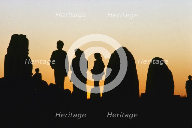 People by Ale's Stones, Kåseberga, Scania, Sweden. Artist: Stefan Hallberg