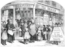 The Grocer's Shop at Christmas - drawn by Foster, 1850. Creator: Edmund Evans.