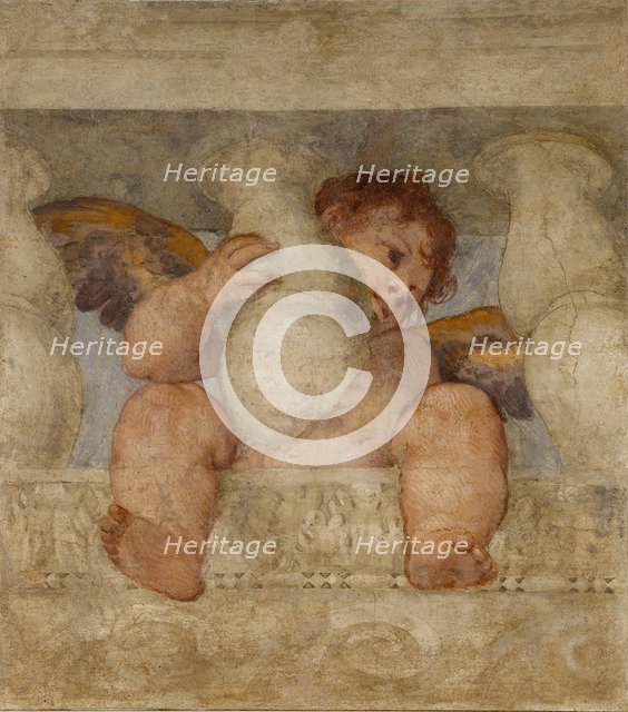 Angel seated on a balustrade.