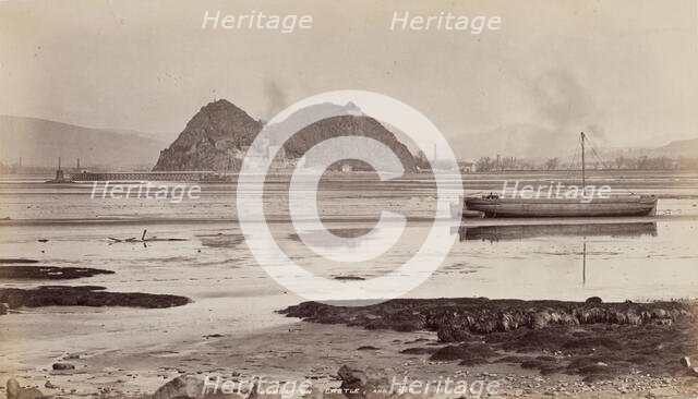 Dumbarton Castle and pier on the Clyde, between 1870 and 1880. Creator: James Valentine.