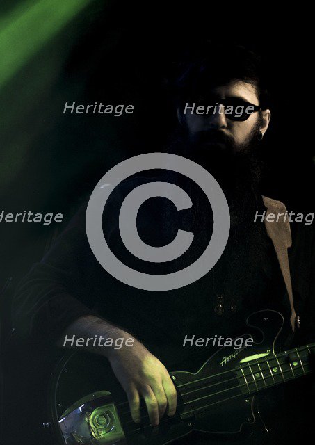 Valerie June's bass player, 2017. Artist: Alan John Ainsworth.