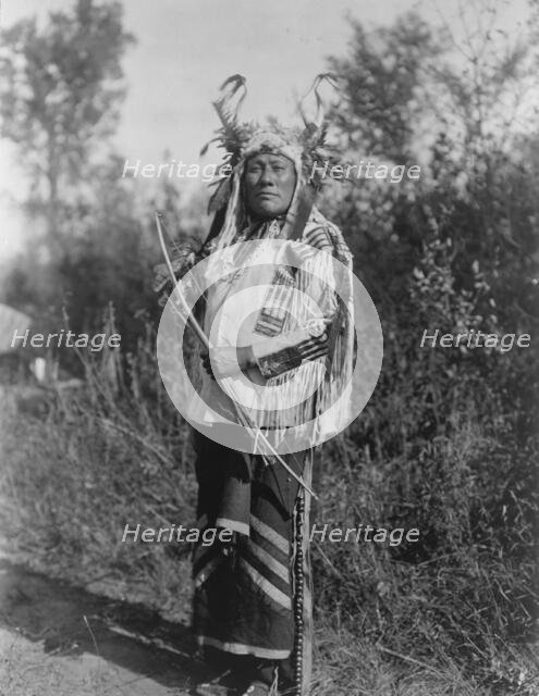 Long Time Dog-Hidatsa, c1908. Creator: Edward Sheriff Curtis.