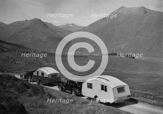 1936 Austin Twenty with caravan and 1936 Oldsmobile Eight with caravan. Creator: Unknown.