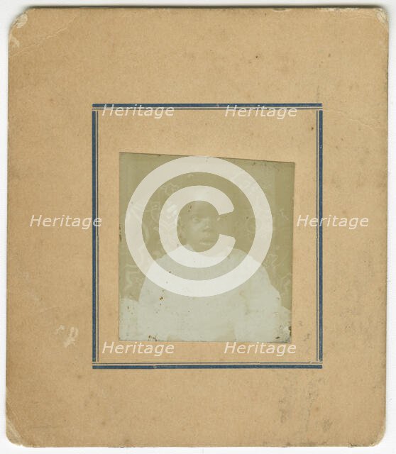 Photograph of a baby sitting in a chair, ca. 1870. Creator: Unknown.