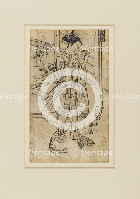 Woodblock print - Onoe Kikingoro I as a woman reading a book, 18th century Artist: Okumura Masanobu.