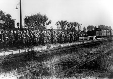 German soldiers on a railway platform awaiting transport, France, August 1940. Artist: Unknown