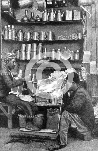 Tinsmiths in a tinsmith's shop, India, 1922.Artist: R Gorbold