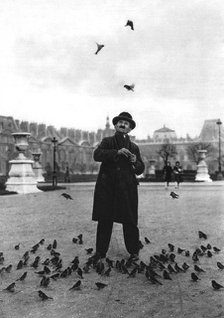 A bird charmer, Paris, 1931.Artist: Ernest Flammarion