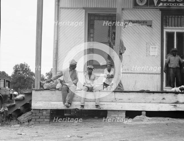 Negroes hanging around the plantation store, Mississippi Delta, 1936. Creator: Dorothea Lange.