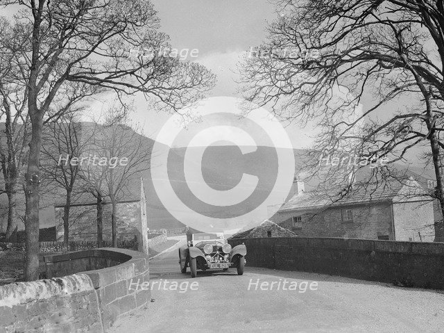 SS Jaguar 100 of Mrs IW McLennan competing in the RAC Rally, 1939. Artist: Bill Brunell.