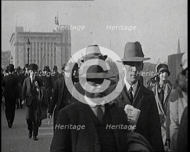 Pedestrians And Commuters Crossing London Bridge, 1920s. Creator: British Pathe Ltd.