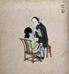 A standing woman preparing to remove facial hair from seated woman using a piece of string, 1800-99. Creator: Unknown.