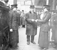 Women ticket collectors, London Bridge Station, London, May 1915. Artist: Unknown