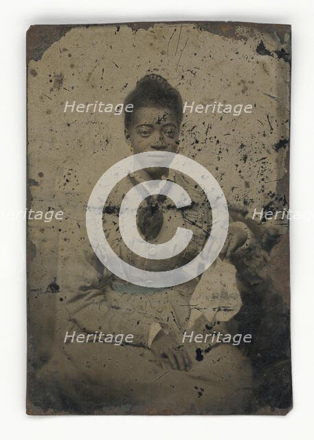 Tintype of a woman, 1856-1900. Creator: Unknown.