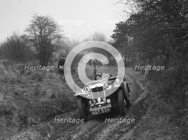 MG Magna of AJV Merritt at the Sunbac Colmore Trial, near Winchcombe, Gloucestershire, 1934. Artist: Bill Brunell.