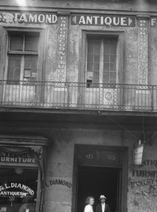Facade of the Diamond antique store, New Orleans or Charleston, South Carolina, c1920-1926. Creator: Arnold Genthe.