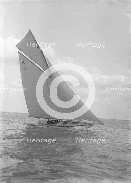 The 8 Metre yacht 'Norman' (H1) sailing close-hauled, 1911. Creator: Kirk & Sons of Cowes.
