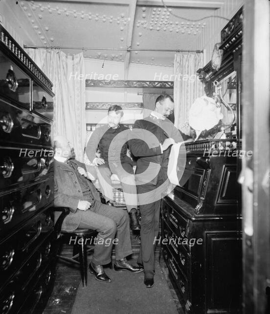 U.S.S. Maine, paymaster's room, 1896. Creator: Unknown.