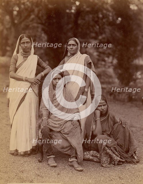 Four Hindu Women, One Seated in a Chair, Outdoors, 1860s-70s. Creator: Unknown.