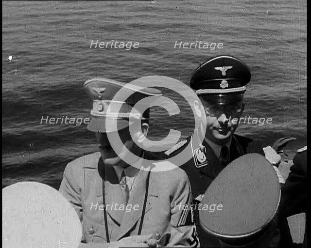 Adolf Hitler and Heinrich Himmler on Board an Italian Navy Battleship, 1937. Creator: British Pathe Ltd.