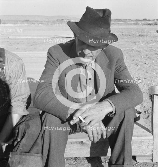 Former Nebraska farmer, now a migrant farm worker, Klamath County, Oregon, 1939. Creator: Dorothea Lange.