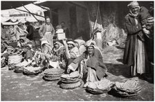 Suq El Khubur, a native bread market, Baghdad, Iraq, 1925.Artist: A Kerim